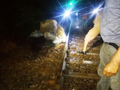 Konkan Railway jumped for 3 hours due to collapsing on the tracks | रुळावर दरड कोसळल्याने कोकण रेल्वे ३ तास ठप्प