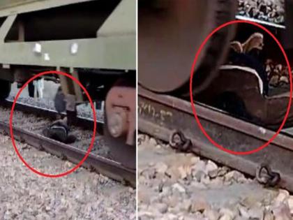 goods train passed over the man lying on the railway track did not even get scratch shocking video | VIDEO: मैं उठेगा नहीं...! रेल्वे ट्रॅकवर पडला दारूडा; अंगावरून मालगाडी जाऊ लागली, अन् मग...