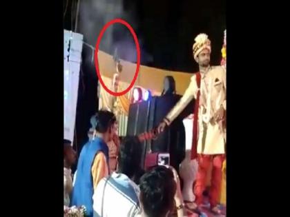 Video: Bride fired in the air with a revolver video viral on social media in Pratapgarh UP | Video: ‘रिवॉल्वर राणी’! लग्नात स्टेजवर जाण्याआधी नवरीकडून गन फायरिंग, घाबरला नवरदेव....