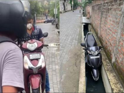 Assam girl teaches a lesson to a molester who groped her on road, scooty goes into drain | शाब्बास पोरी! छेड काढणाऱ्या रोड रोमियोला शिकवला असा धडा, की स्कुटीसकट पडला नाल्यात