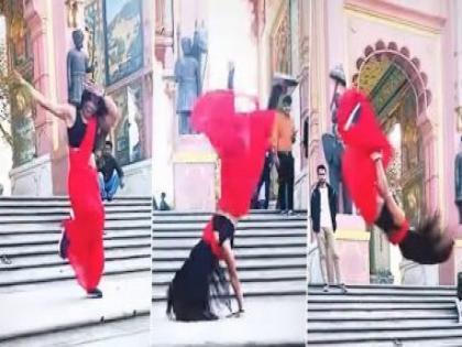 young girl Misha doing backflip in red saree, mind-blowing stunt goes viral | साडी नेसून तरुणीचा चित्तथरारक स्टंट,मारली हवेत उलटी उडी, व्हिडिओ पाहुन व्हाल हैराण