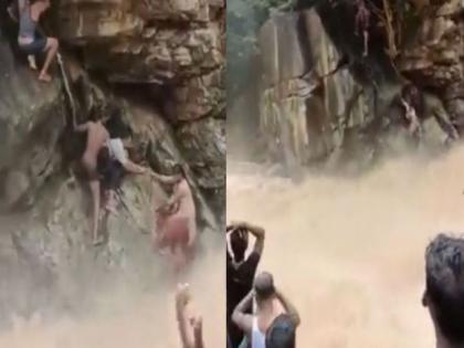 Tamil Nadu : Woman and Child trapped anaivari waterfalls rescued by brave hearts video goes viral | VIDEO : वॉटरफॉलमध्ये अचानक आला पूर, पाण्यात अडकलेल्या आई-मुलाला असं वाचवलं...