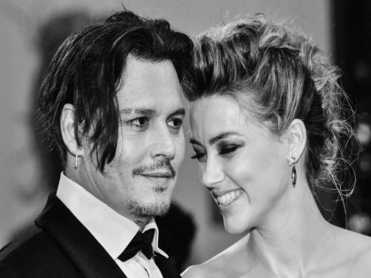 Amber Heard after losing the case against ex husband Johnny Depp says I still love him | जॉनी डेपकडून केस हरल्यानंतर बदलला एम्बर हर्डचा सूर, म्हणाली - मी अजूनही त्याच्यावर प्रेम करते...