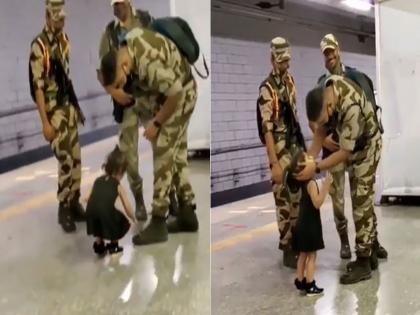 Viral video of cute girl touching feet of Indian soldier | VIDEO : या चिमुकलीने खास अंदाजात केला जवानांचा सन्मान, बघून कराल तिचं भरभरून कौतुक