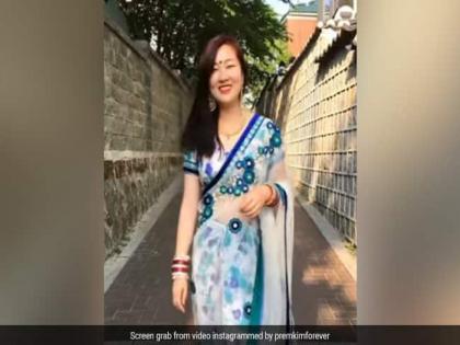 For the first time a korean woman wore a sari watching the video people said you are looking beautiful | कोरियन महिलेने पहिल्यांदा नेसली साडी, व्हिडीओ पाहून लोक म्हणाले - खूपच सुंदर....