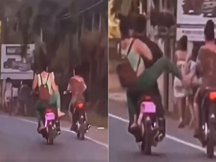 Viral video : Girls stupidity turn disaster this happened while kicking on the road | VIDEO : तरूणीचा मूर्खपणा तिलाच पडला महागात, दुसऱ्याला पाडणार इतक्यात स्वत:च....