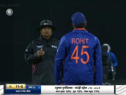 IND vs SL, 2nd T20I Live Updates : Rohit Sharma is having a chat with the umpire, Looks like he is saying the big, white advertising board is a distraction for the slip fielder | IND vs SL, 2nd T20I Live Updates : रोहित शर्मा झाला नाराज, भुवनेश्वरची ओव्हर थांबवत Umpire कडे केली तक्रार; पाहा नेमकं काय झालं