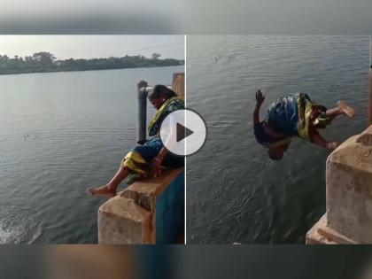 Viral Video Old Lady in Saree jumps into the river from High Bridge swimming Video goes viral Inspirational | Old Lady swimming in Saree, Video: आजीबाईंची कमाल! साडी नेसून ब्रिजवनरून मारली नदीत उडी, पुढे काय घडलं पाहा...