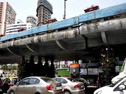 A gap is visible at Kemps Corner Bridge. It can collapse, police got a phone call | ब्रिजला गॅप, डोक्याला ताप, पाेलिसांना फाेन आला आणि वाहतुकीचा बाेजवारा उडाला