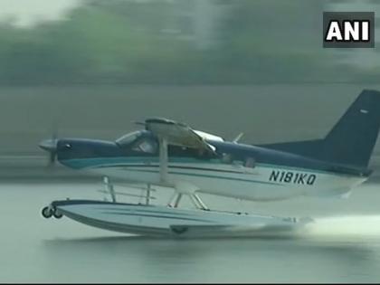 Prime Minister Narendra Modi's flight of Si-Plane in Dharoi dam, Modi will be leaving for a darshan in the idol temple | VIDEO - धारोई धरणात पंतप्रधान नरेंद्र मोदींच्या सी-प्लेनचे लँडिंग, अंबाजी मंदिरात दर्शनासाठी रवाना