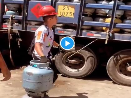 Viral Video: It's called Perfection! boy is throwing gas cylinders in the truck, one on one, one on one ... | Viral Video: याला म्हणतात परफेक्शन! पोरगा खालून ट्रकमध्ये गॅस सिलिंडर फेकतोय, एकावर एक, एकावर एक...