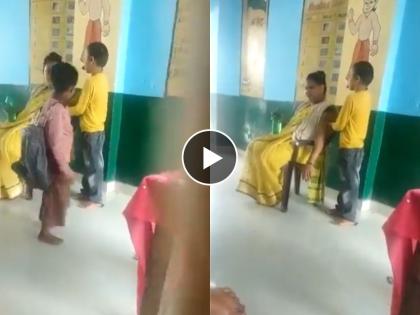 student is massaging teachers back | मुलांकडून मसाज करुन घेतायत शिक्षिका, सरकारी शाळेतील धक्कादायक प्रकार व्हायरल