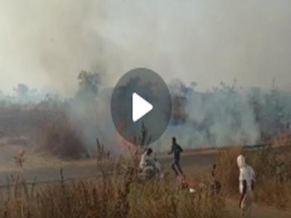 Video: Factory explosion in barshi, fire spread to 2 km; The grass was blown back and forth with the wind! | Video: बार्शीत कारखान्यात स्फोट, आगीचे लोण २ किमीपर्यंत पसरले; वाऱ्यासह गवत पुढेपुढे जळत गेले!