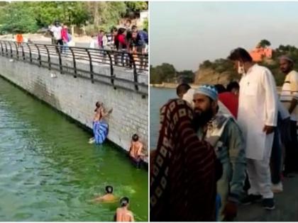 Ajmer fierce competition among people to loot 200 and 500 notes floating in anasagar lake | बाबो! तलावात २००, ५०० रुपयांच्या नोटा तरंगल्या, पैसे लुटण्यासाठी लोकांनी पाण्यात उड्या मारल्या अन्...