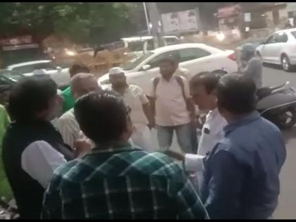 Solapur News: Airline protestors threatened with guns in Solapur by dharmaraj kadadi; Video viral | Solapur News: सोलापूर: विमानसेवेच्या आंदोलकांना धर्मराज काडादींनी पिस्तुल दाखवत धमकावले; Video व्हायरल