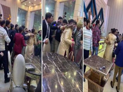 Groom beaten by family due to demand for dowry ,viral video from ghaziabad | लग्न मंडपातच नवऱ्याला फरफटत नेत धु-धु धुतला; कारण ऐकून लोकांनी कौतुक केलं