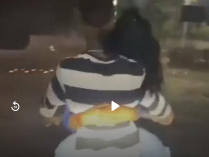 The young man was doing stunts by putting the young woman on the tank of a two-wheeler, then something like this happened... | तरुणीला दुचाकीच्या टाकीवर बसवून स्टंटबाजी करत होता तरुण, तेवढ्यात घडलं असं काही...