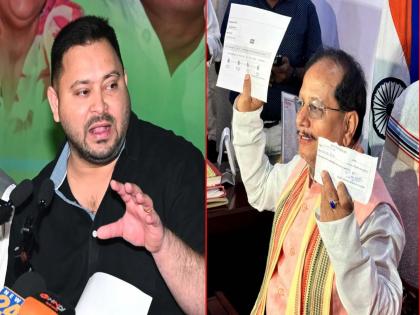 Voter list confusion continues in Bihar 2 voter cards in the name of Deputy Chief Minister Tejashwi Yadav reveals | मतदार याद्यांचा घोळ कायम, बिहारच्या उपमुख्यमंत्र्यांच्याच नावे २ व्होटर कार्ड; तेजस्वी यादव यांनी केली पोलखोल Voter list confusion continues in Bihar 2 voter cards in the name of Deputy Chief Minister Tejashwi Yadav reveals | मतदार याद्यांचा घोळ कायम, बिहारच्या उपमुख्यमंत्र्यांच्याच नावे २ व्होटर कार्ड; तेजस्वी यादव यांनी केली पोलखोल