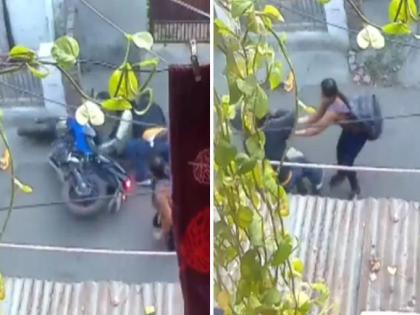  Thieves who stole coiL from grandmother in Uttar Pradesh's Meerut were thrown off their bikes by a young woman, watch video  | VIDEO: आज्जीचे कानातले ओढणाऱ्या चोरट्यांना नातीने दाखवला इंगा; पाहा जेव्हा तरूणी बनते 'सिंघम' 