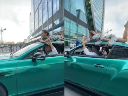 SHOCKING: In 'trust test' stunt, influencer drives car with girlfriend tied to roof; draws flak, Video | SHOCKING: प्रेमाच्या 'खात्री'साठी जीवघेणी परीक्षा; गर्लफ्रेंडला टपावर बांधलं अन् रस्त्यावर पळवली कार, Video