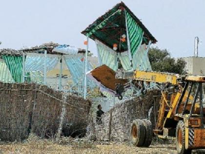 Businessmen on the land of Nagpur University hammered | नागपूर विद्यापीठाच्या जमिनीवरील व्यावसायिकांना दणका