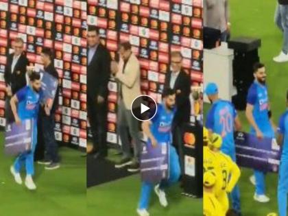 IND vs AUS: Virat Kohli runs hilariously after receiving 'Energetic Player of the Series' award, Watch Video  | IND vs AUS : Energetic Player चा पुरस्कार मिळाला अन् विराट कोहली 'चेक' घेऊन पळाला! Video Viral