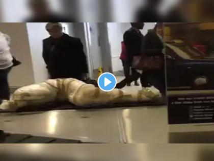 Shocking Video Confused passengers look on as corpse like package appears at london airport Viral on social media | Airport Viral Video: एअरपोर्टवर प्रवासी सामानाची वाट पाहत असताना अचानक 'ती' वस्तू आली अन्...