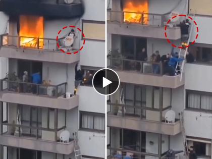 a heroic neighbors and firefighters save 6 years old boy from apartment fire video goes viral on social media | VIDEO : शेजारी असावा तर असा! स्वत:चे प्राण पणाला लावत आगीत अडकलेल्या चिमुकल्याचे वाचवले प्राण 