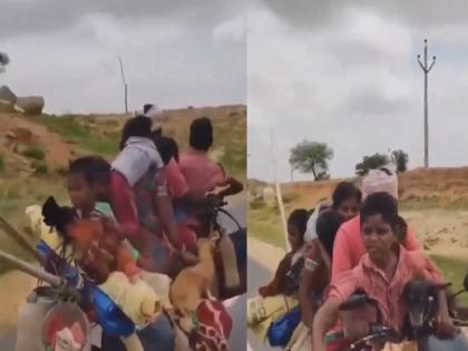 7 people, two dogs, one goat and one rooster on a single bike; You will be amazed after watching the VIDEO... | एकच बाईकवर 7 लोक, दोन कुत्री, एक बकरी अन् कोंबडा; VIDEO पाहून चक्रावून जाल...