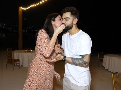 Soon to be parents Virat Kohli and Anushka Sharma cut a cake in UAE with RCB teammates around | 45 हजारांचा ड्रेस अन् जंगी पार्टी; विराट-अनुष्कानं दुबईत केक कापून साजरा केला आनंद!