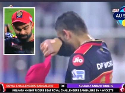 IPL, 2021 RCB vs KKR : Virat Kohli as Captain of RCB for the very last time; RCB Captain crying video goes viral Watch  | IPL, 2021 Virat Kohli Crying : पराभवानंतर विराट कोहली रडला; व्हायरल व्हिडीओ पाहून चाहतेही झाले भावुक, Video 