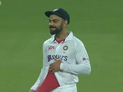 IND vs SL, 2nd Test Pink Ball Test Live Updates : Fans chanting RCB, Kohli shows the red inner he’s wearing, Watch Video | Virat Kohli, IND vs SL, 2nd Test : चाहत्यांचा RCB... RCB... चा नारा अन् विराट कोहलीची कृती चर्चेत, पाहा Video  