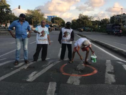 Vietnam Airlines pilot upset over potholes in Mumbai; Extinguished with orange | व्हिएतनाम एअरलाइन्सचा पायलट मुंबईतील खड्ड्यांवर नाराज; नारिंगी रंगाने रंगविले