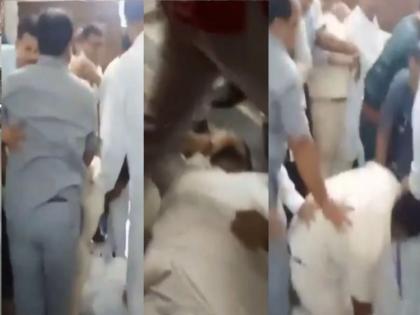 High drama erupted in the West Bengal Assembly as TMC and BJP MLAs clashed during a debate | Video: बंगाल विधानसभेत जोरदार राडा; BJP-TMC आमदारांमध्ये फ्री स्टाईल हाणामारी, कारण... High drama erupted in the West Bengal Assembly as TMC and BJP MLAs clashed during a debate | Video: बंगाल विधानसभेत जोरदार राडा; BJP-TMC आमदारांमध्ये फ्री स्टाईल हाणामारी, कारण...