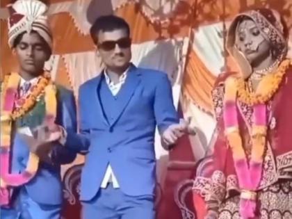 Wedding viral video bride groom funny video goes viral on social media | आरारारारा खतरनाक! स्टेजवर नवरी-नवरदेवासोबत 'त्याने' केलं असं काही, म्हणाल -हा तर साउथचा हिरो!