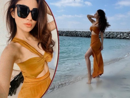 Mouni roy posts her bold photos from dubai beach amid marriage rumours with suraj nambiar | लग्नाच्या चर्चांमध्ये मौनी रॉयचे दुबईतल्या समुद्र किनाऱ्यावरचे बोल्ड फोटो व्हायरल