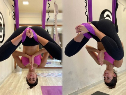Ananya Panday nails aerial Yoga inversion for the first time, read benefits of the exercise inside | फिटनेसच्या बाबतीच भल्याभल्यांना टक्कर देते ही अभिनेत्री, ओळखा पाहू