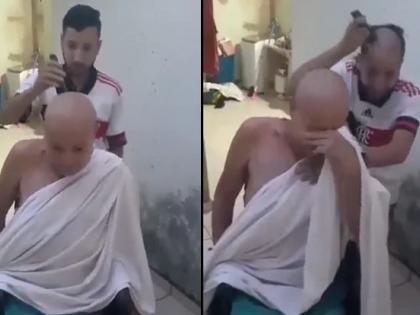 son shaves head to support father battling cancer video goes viral on social media | कौतुकास्पद! कॅन्सरग्रस्त वडिलांसाठी मुलाने जे केलं ते पाहून तुमचेही डोळे पाणावतील; Video व्हायरल