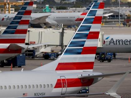 American Airlines plane grounded after passenger rushes cockpit, damages controls | माथेफिरू प्रवाशाची सटकली; थेट विमानाच्या कॉकपीटमध्ये शिरला अन् मग....