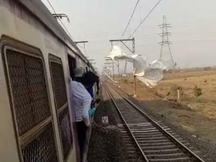 mumbai train update central railway disrupted towards kasara | Mumbai Train Update : मध्य रेल्वेची वाहतूक विस्कळीत; ओव्हरहेड वायरला अडकली ताडपत्री