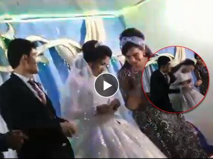 bride won the game at wedding groom slapped her hard family relatives lost their senses | Video - लग्नातल्या खेळात नवरी जिंकताच संतापला नवरदेव; मारली थप्पड, नातेवाईक झाले हैराण