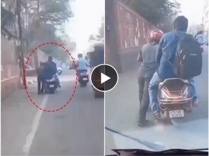 customer refuses to dismount bike after running out of petrol rider pushes to nearest station | पेट्रोल संपलं पण कस्टमर खाली उतरलाच नाही; रॅपिडो चालकाने मारला धक्का, Video व्हायरल