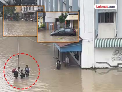 Vidarbha Rain : 24 hours of danger! Rain wreaks havoc in Nagpur; Residential areas flooded, school students pulled out with ropes | Vidarbha Rain : २४ तास धोक्याचे ! नागपुरात पावसाचा कहर; वस्त्या जलमय, शाळेतील विद्यार्थ्यांना दोरीने काढले बाहेर