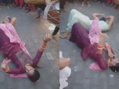 Womens unique dance to the beat of the drum, rolling on the ground; Video goes viral! | Viral Video: ढोल- ताशाच्या तालावर महिलांचा हटके डान्स, थेट जमिनीवर लोळल्या; व्हिडीओ व्हायरल! Womens unique dance to the beat of the drum, rolling on the ground; Video goes viral! | Viral Video: ढोल- ताशाच्या तालावर महिलांचा हटके डान्स, थेट जमिनीवर लोळल्या; व्हिडीओ व्हायरल!