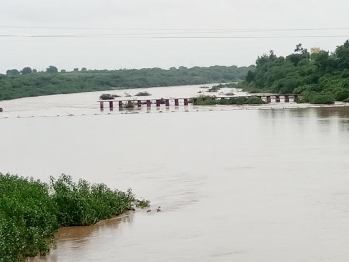 Parbhani: Godavari, Purna started flowing in full | परभणी : गोदावरी, पूर्णा दुथडी भरून वाहू लागल्या Parbhani: Godavari, Purna started flowing in full | परभणी : गोदावरी, पूर्णा दुथडी भरून वाहू लागल्या