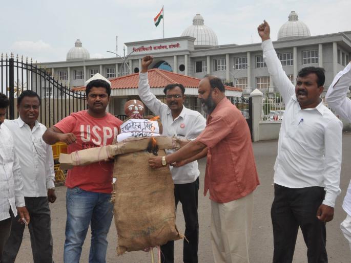 Sangli: Due to the burning of Union Agriculture Minister, action on agitators | सांगली : केंद्रीय कृषिमंत्र्यांच्या पुतळ्याचे दहन, आंदोलकांवर कारवाई