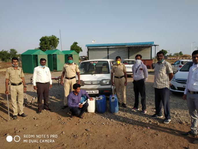 Illegal liquor seized near Nandgaon | नांदगावजवळ अवैध दारू जप्त Illegal liquor seized near Nandgaon | नांदगावजवळ अवैध दारू जप्त