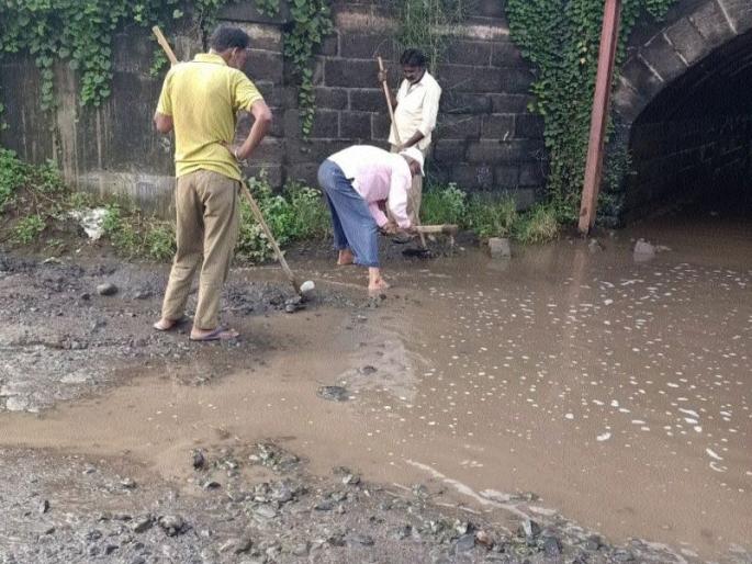 Like a lake under a railway bridge | रेल्वे पुलाखाली साचला जणू तलाव Like a lake under a railway bridge | रेल्वे पुलाखाली साचला जणू तलाव