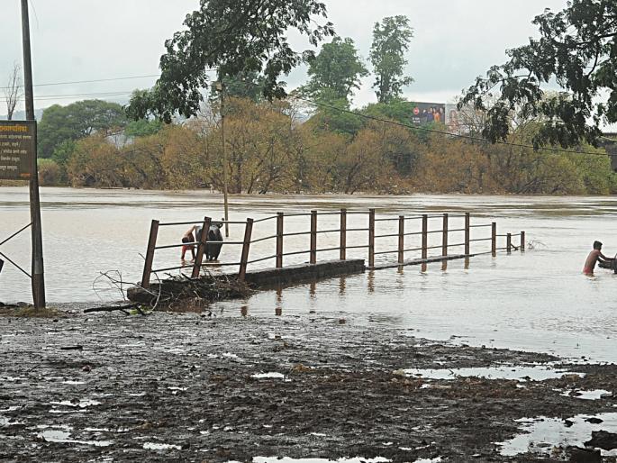The two gates of Radhanagari continue, but the rain falls | राधानगरीचे दोन दरवाजे सुरूच, पावसाची मात्र उघडझाप The two gates of Radhanagari continue, but the rain falls | राधानगरीचे दोन दरवाजे सुरूच, पावसाची मात्र उघडझाप