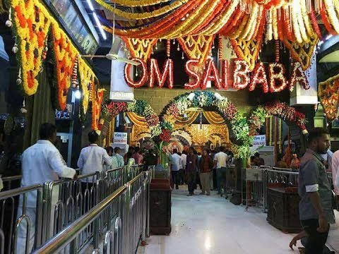 A device for measuring the temperature of devotees in Sai Mandir | साईमंदिरात भाविकांचे तापमान मोजण्यासाठी यंत्र A device for measuring the temperature of devotees in Sai Mandir | साईमंदिरात भाविकांचे तापमान मोजण्यासाठी यंत्र